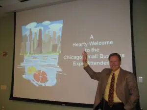 Man welcoming Chicago small business expo attendees.