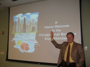 Man welcoming Chicago small business expo attendees.