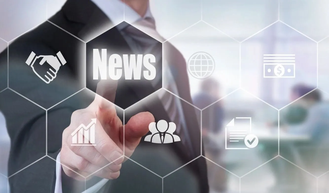 Businessman tapping virtual news icon interface